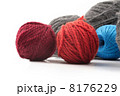 Several balls of wool on a white background 8176229