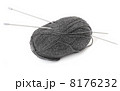 Ball of wool and knitting needles, white background 8176232