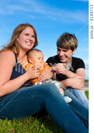 Family in summer - Mother, father and child Family in summer - Mother, father and child 8188713