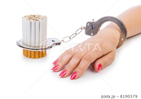 Addition concept with cigarettes and handcuffs Addition concept with cigarettes and handcuffs 8190379