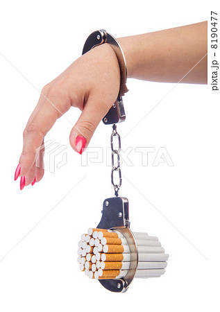 Addition concept with cigarettes and handcuffs 8190477