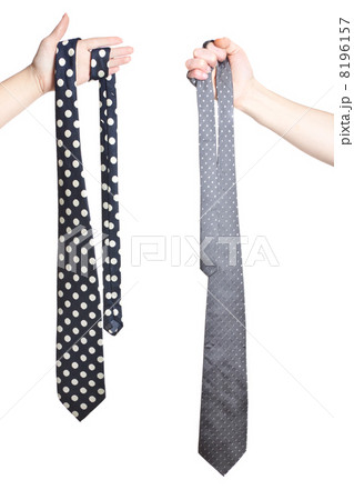 two hand holding tie's two hand holding tie's 8196157