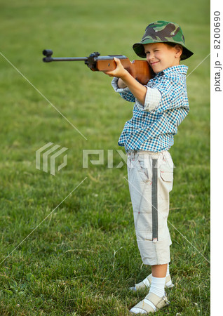 little boy with airgun 8200690