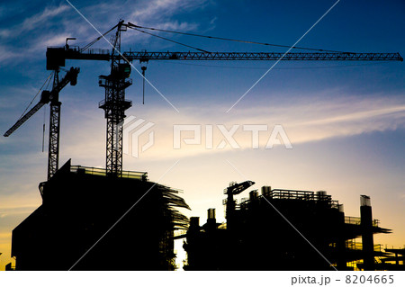 Construction site with cranes on sky background Construction site with cranes on sky background 8204665