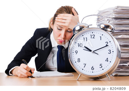 Woman businesswoman with giant alarm clock Woman businesswoman with giant alarm clock 8204809