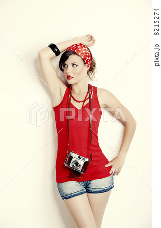 Pin-up girl with a camera Pin-up girl with a camera 8215274