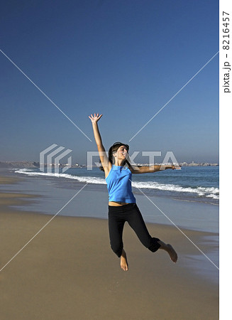 Jumping on the beach. Jumping on the beach. 8216457