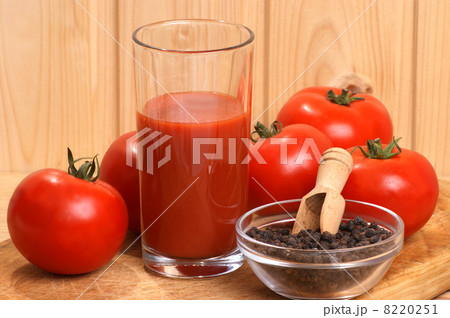 some organic tomato juice in a glass some organic tomato juice in a glass 8220251