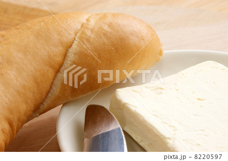 breakfast with bread roll and organic butter breakfast with bread roll and organic butter 8220597