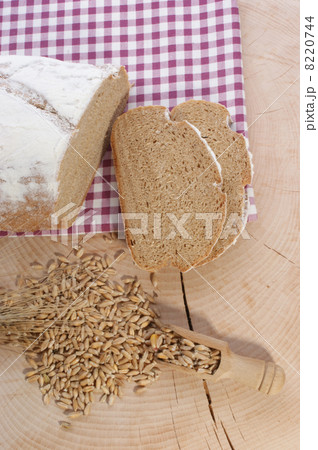Cottage loaf and cereal on a timber background 8220744