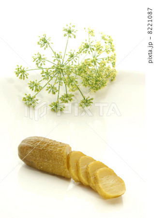 one sour gherkin cut half into slices one sour gherkin cut half into slices 8221087