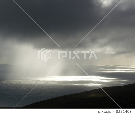very dark rain clouds and sun rays very dark rain clouds and sun rays 8221403