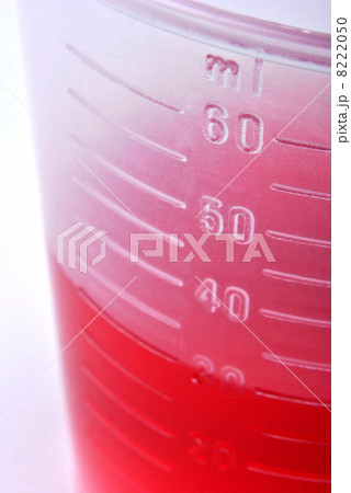 30 ml red liquid as medicine in a small container 8222050