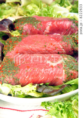 fresh organic beef roulade on a plate fresh organic beef roulade on a plate 8222633