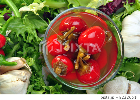 organic red cherry paprika with vinegar in a glass 8222651