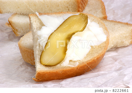 Lard with gherkin on home baked bread 8222661