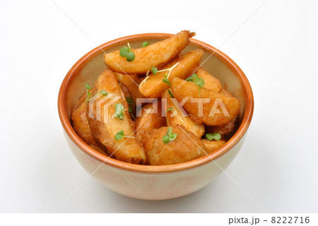 some fried potato wedges in a bowl 8222716