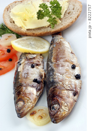 some freshly grilled sardines prepared as food 8222757
