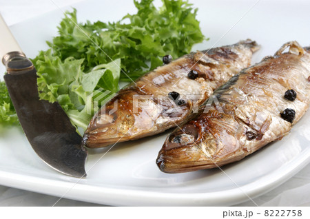 some freshly grilled sardines prepared as food some freshly grilled sardines prepared as food 8222758