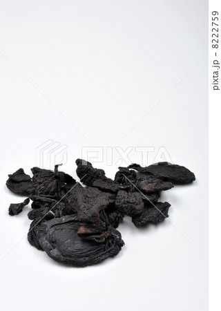 organic black tamarind on a white background organic black tamarind on a white background 8222759