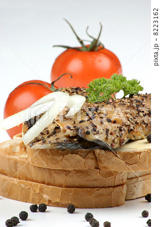 smoked mackerel fillet on toast with pepper and tomato smoked mackerel fillet on toast with pepper and tomato 8223162