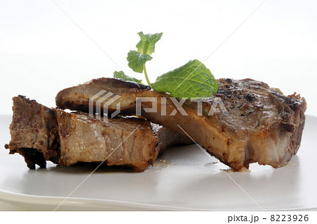 organic grilled lamb chop on a plate 8223926