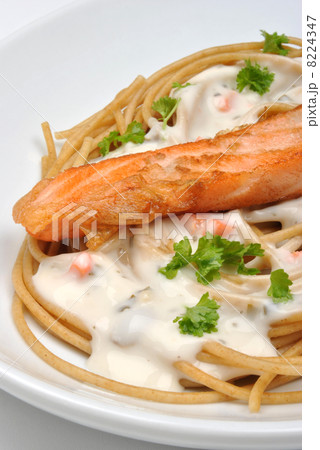 salmon steak with home made spaghetti and parsley salmon steak with home made spaghetti and parsley 8224347