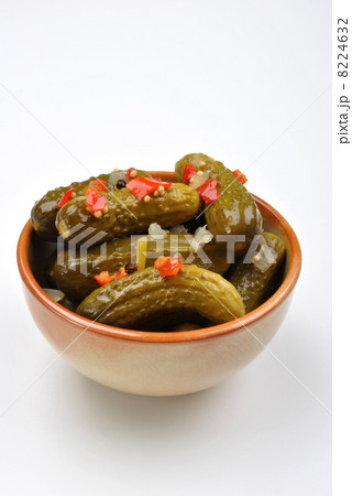some organic sour gherkin and a white background 8224632