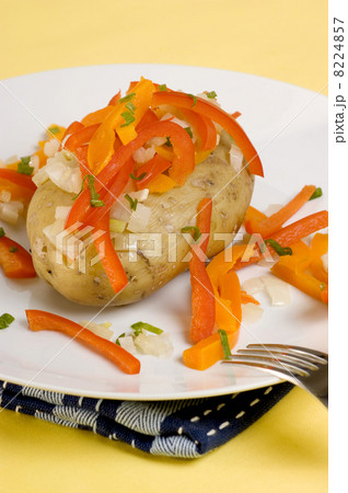 boiled potato with organic paprika on a plate 8224857
