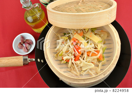 asian stir fry mix in a bamboo steamer 8224958
