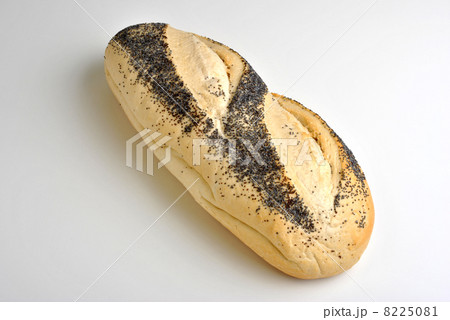 fresh baked poppy seed bread and bright background 8225081