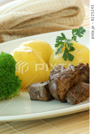 liver goulash on pasta with organic broccoli 8225245