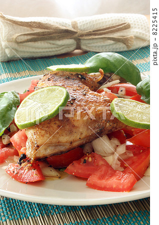 roasted delicious chicken and organic tomato salad 8225415