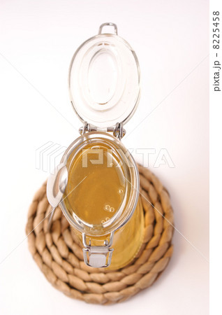 glass filled with sweet honey glass filled with sweet honey 8225458