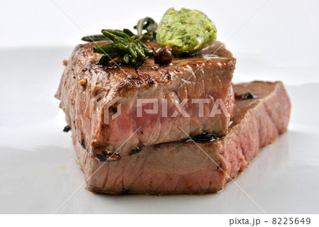 grilled organic steak on a white plate 8225649