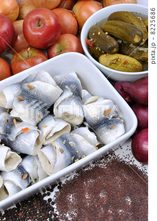 some fresh organic rollmops in a white bowl some fresh organic rollmops in a white bowl 8225686