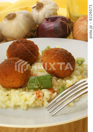 meatballs with organic rice on a plate 8226073