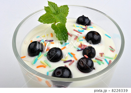 some organic blackberries in natural yoghurt and mint some organic blackberries in natural yoghurt and mint 8226339