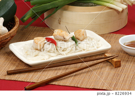 asian style noodle and chicken on a plate asian style noodle and chicken on a plate 8226934