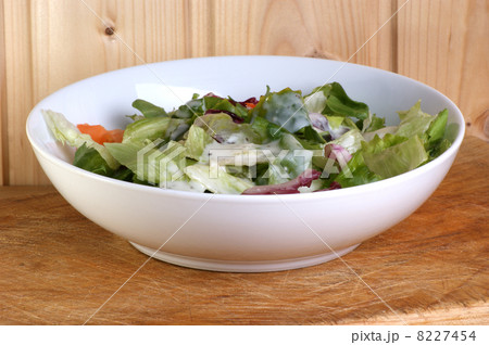 fresh organic summer salad in a white bowl 8227454