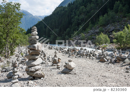 Many cairn man-made stone piles (Folgefonna National Park, Norwa 8230360