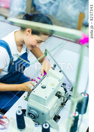 Indonesian seamstress in a textile factory 8237343