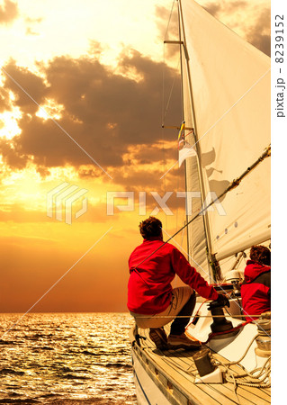 People on sailing boat in the sea People on sailing boat in the sea 8239152