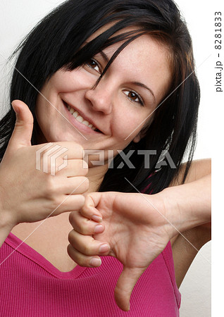 a young woman show with her thumb 8281833