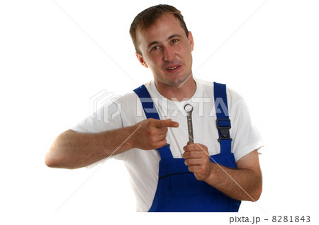 Craftsmen with safety helmet holding a wrench 8281843