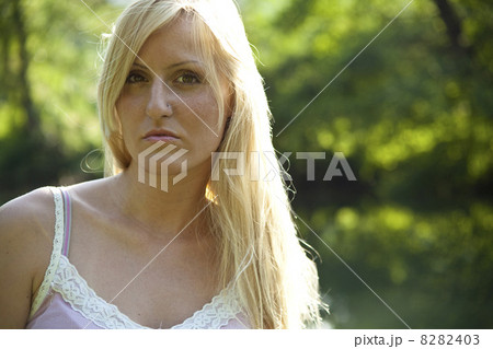 Woman resting on river 8282403