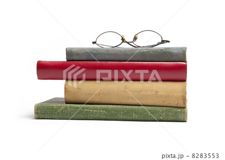 Group of Old Books And Glasses 8283553