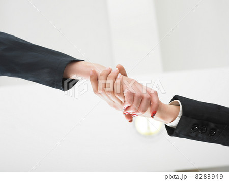 Handshaking in office low angle 8283949