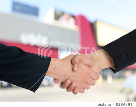 Architectural Handshaking in front of building 8284291