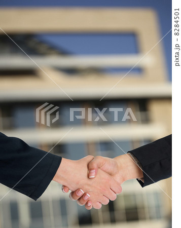 Architectural Handshaking in front of building 8284501
